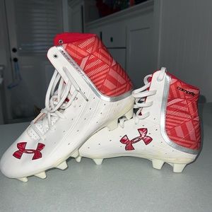 One of a kind Womens size 9 Under Armour highlight high top cleats never worn